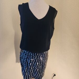 GUESS Black dress with black and silver sequin skirt. Size 6.
